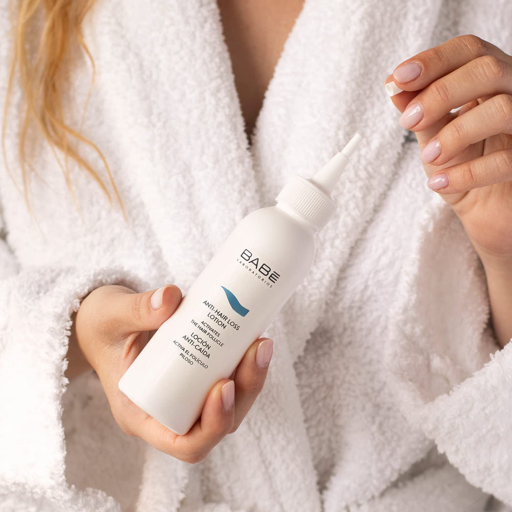 Babe Laboratorios Anti Hair Loss Lotion application scene showing easy scalp care routine