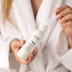 Babe Laboratorios Anti Hair Loss Lotion application scene showing easy scalp care routine