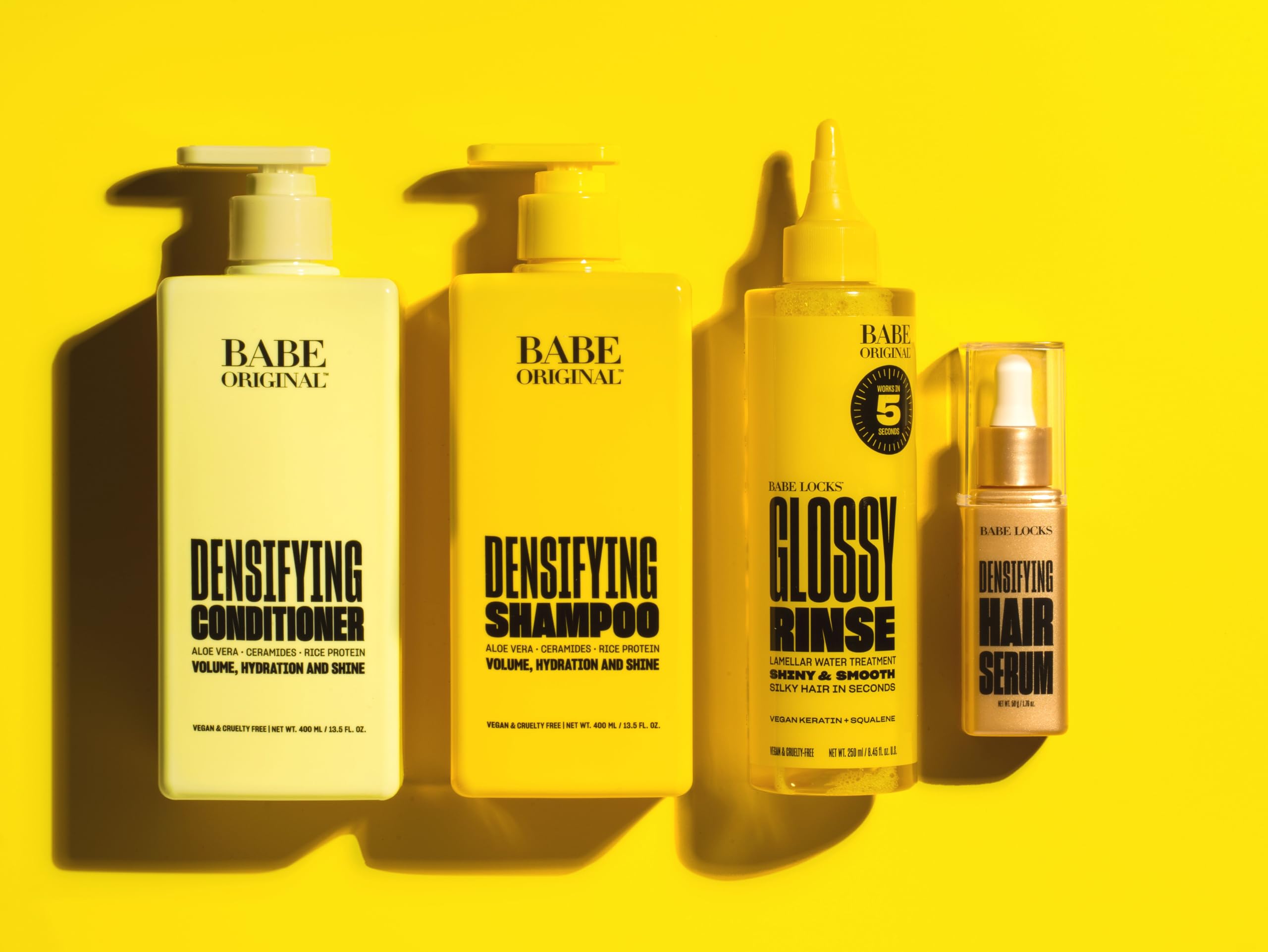 BABE ORIGINAL Locks Densifying Shampoo application shot shows massaging cleanse.