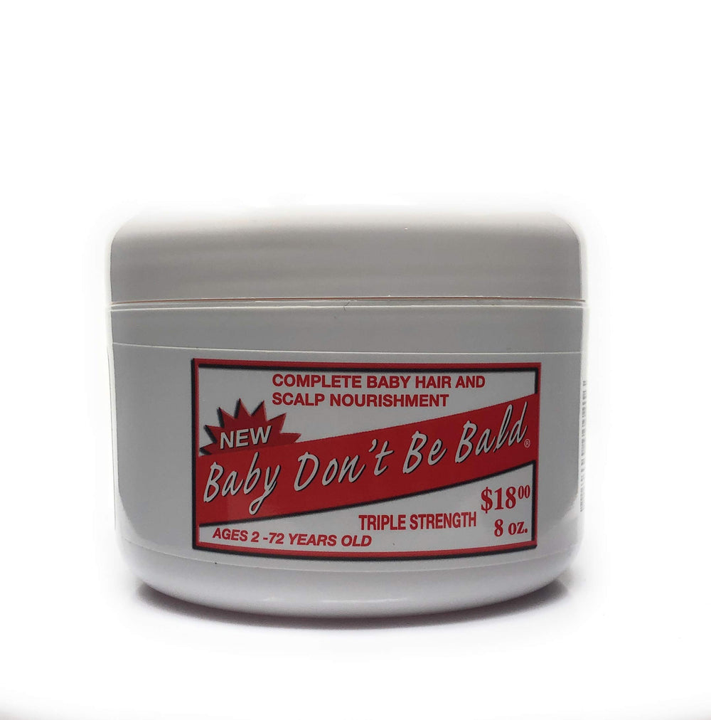Baby Don't Bald bottle with pour spout shows easy application and growth support.