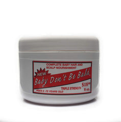 Baby Don't Bald bottle with pour spout shows easy application and growth support.