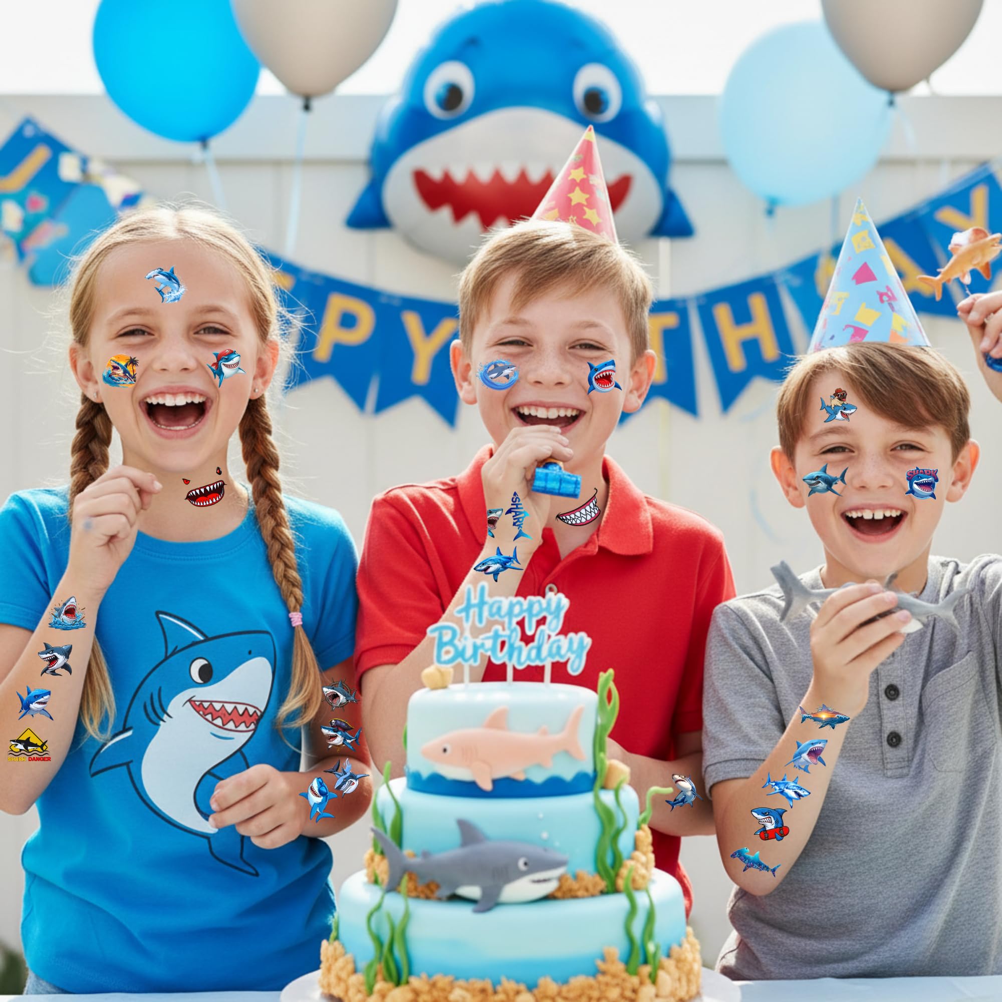 Child applying Backtopeia shark tattoo at a birthday party.