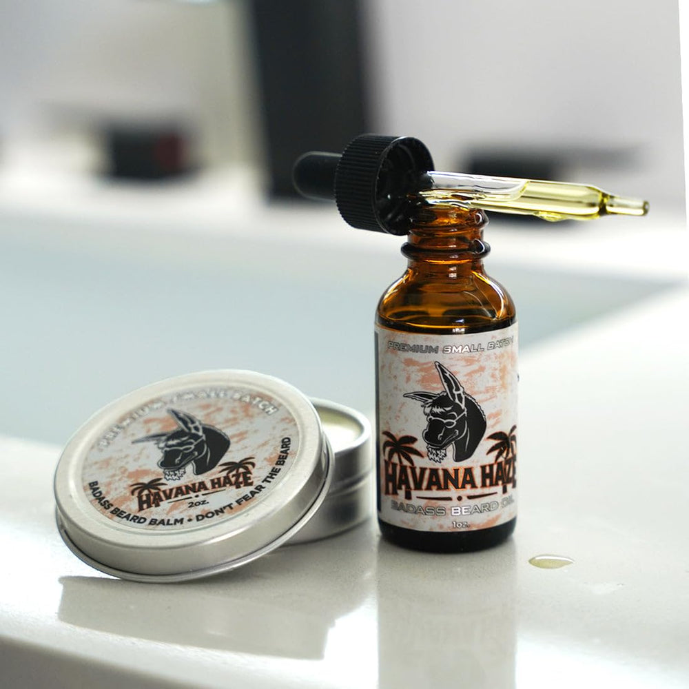 Scoop of Havana Haze balm ready to soften hair.
