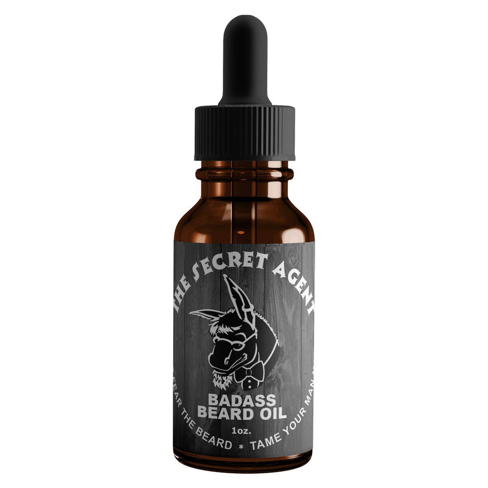 Badass Beard Care unscented oil bottle with dropper softly conditions beard and skin.