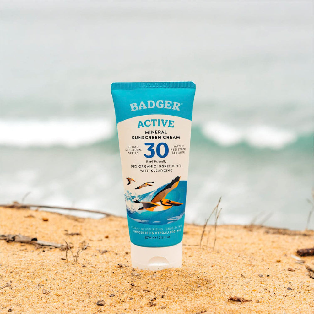 Badger unscented sunscreen rubbed into skin for clear coverage