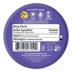 Close-up of Badger SPF 50 mineral sunscreen label highlighting reef-safe formula.