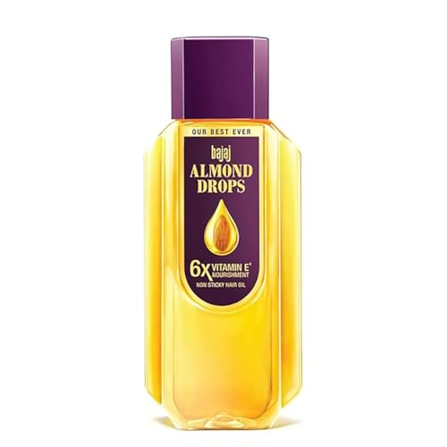 Bajaj Almond Drops Oil bottle close-up highlighting 3X Vitamin E nourishes scalp.
