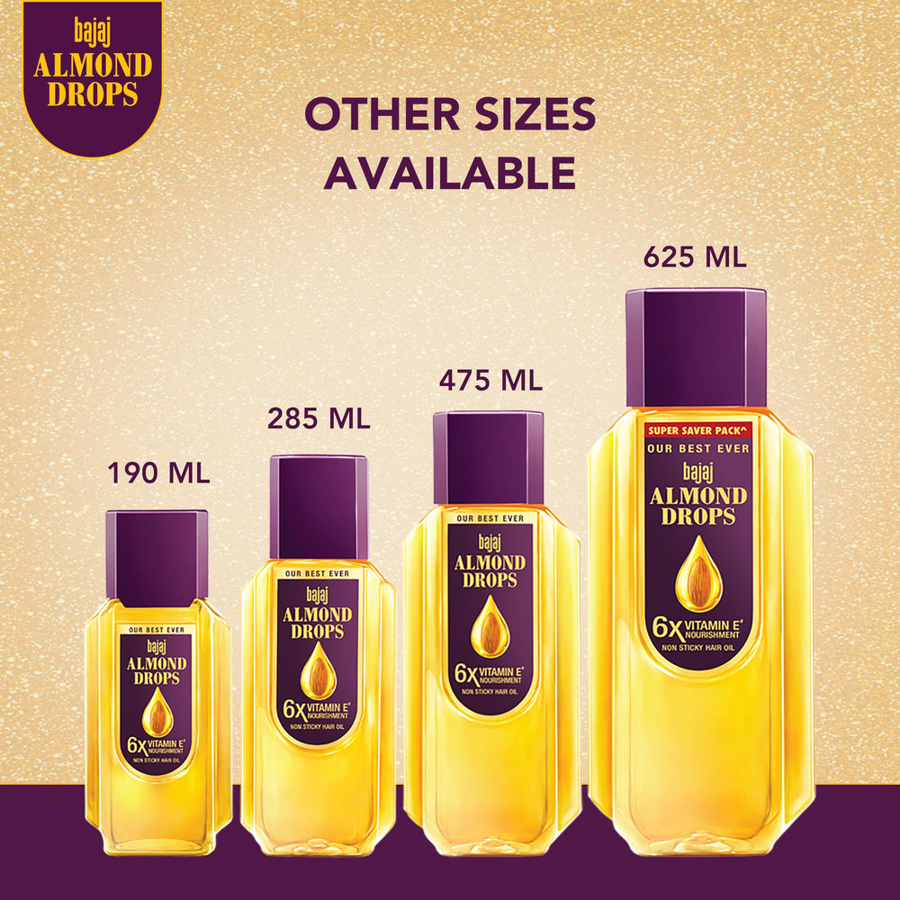 Bajaj Almond Drops oil being dispensed showing light absorption.