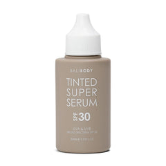 Bali Body Tinted Super Serum SPF30 Tan bottle showing daily hydration.