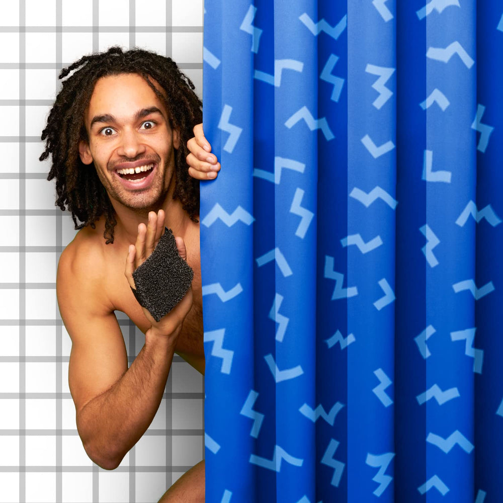 Secure grip with Ballsy Handy Shower Tool's never-drop strap