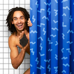 Secure grip with Ballsy Handy Shower Tool's never-drop strap