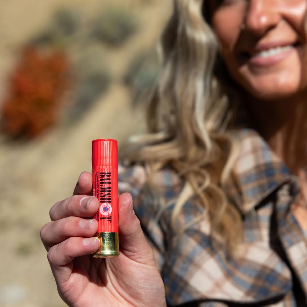 Balmshot Raspberry lip balm packaged in a durable shotgun shell tube.