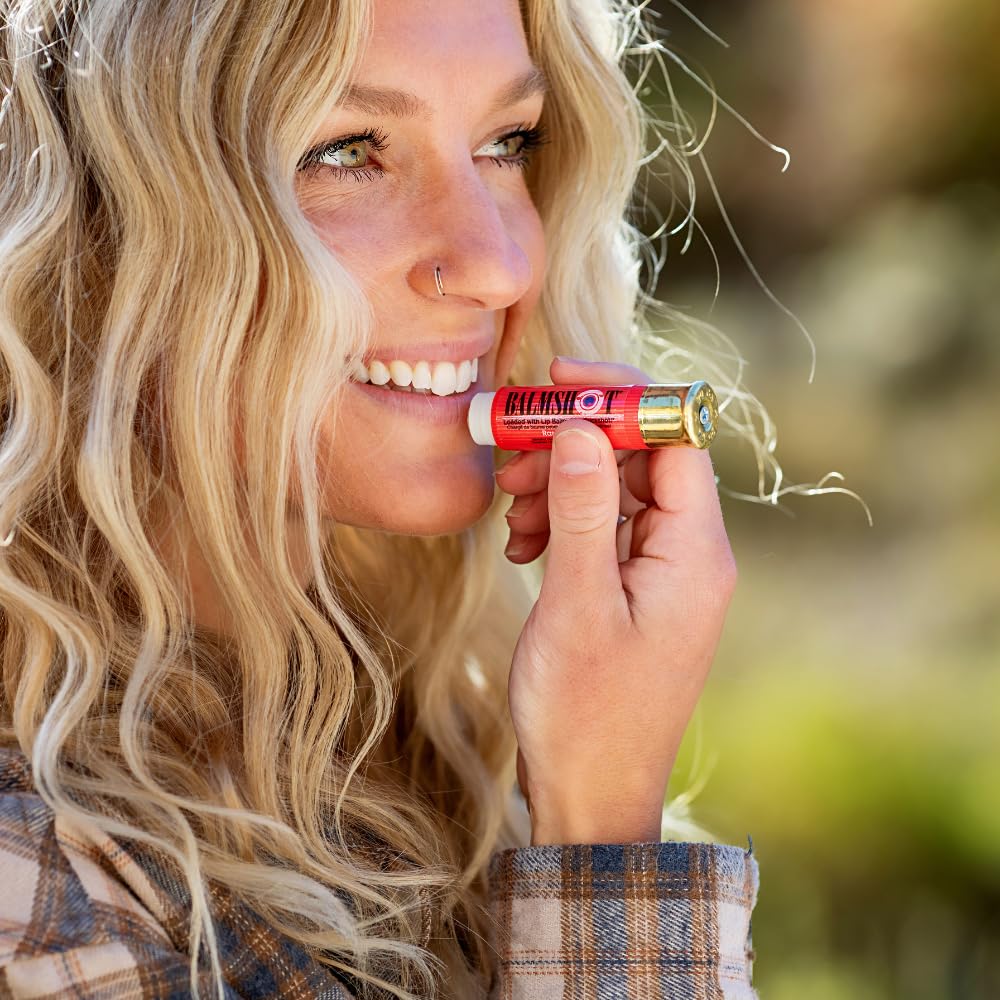 Balmshot Raspberry lip balm SPF 15 for sun protection.