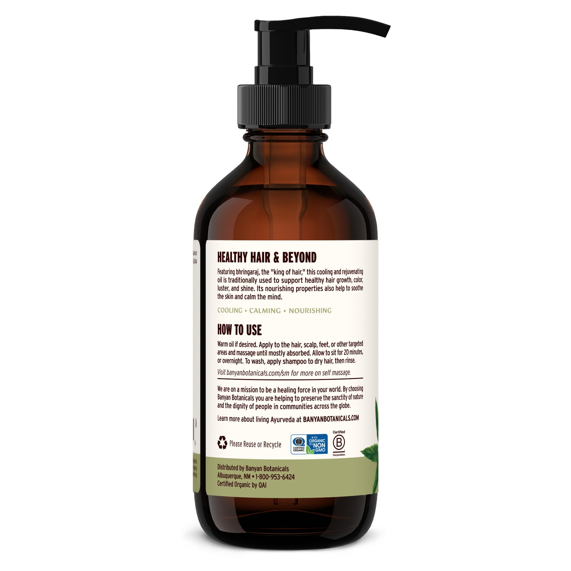 8 oz Banyan Botanicals Bhringaraj oil bottle on a bathroom shelf.