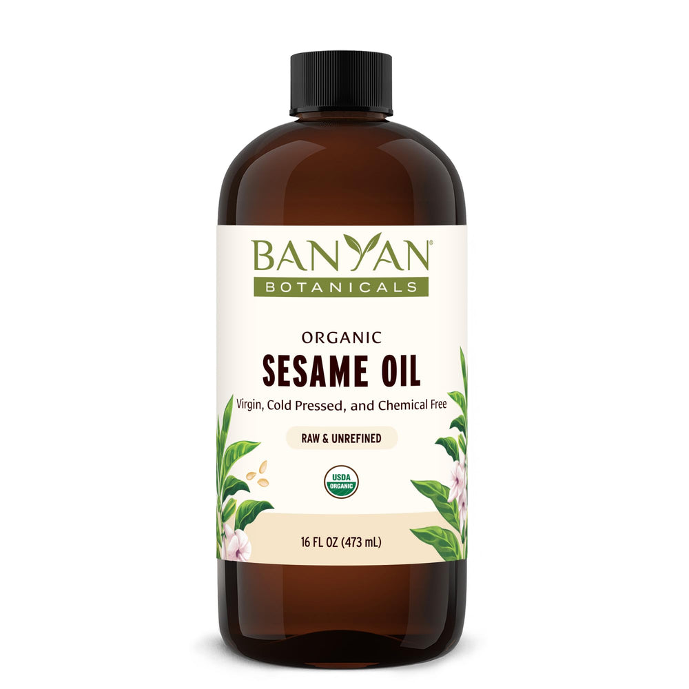 Banyan Botanicals sesame oil bottle, golden oil ready for organic skin massage.