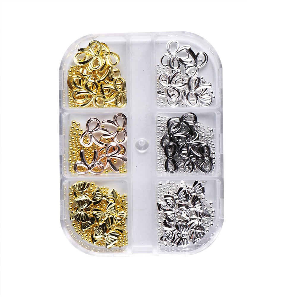 Baoyaalin detailed rhinestones enhance glittering bow designs on nails.