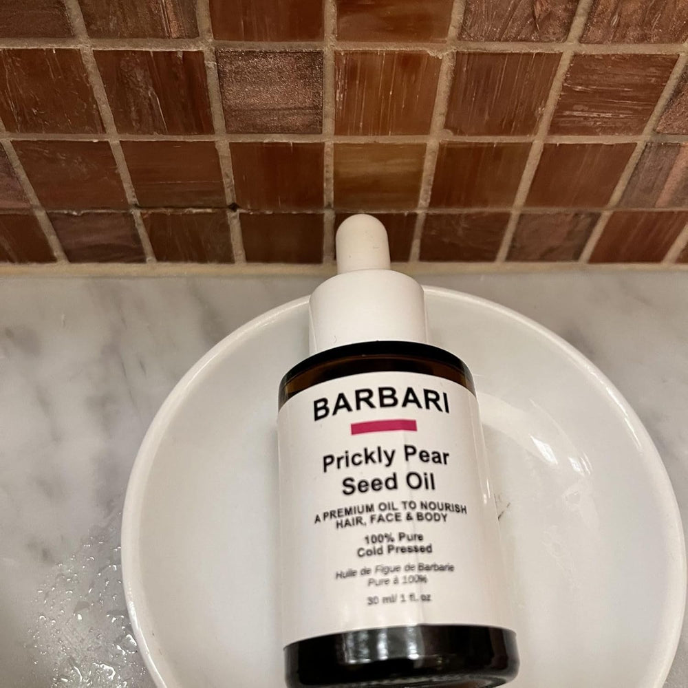 BARBARI Prickly Pear Oil absorption close-up shows lightweight finish.