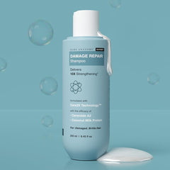 Bare Anatomy Damage Repair Shampoo lather demonstrates smoothing and frizz-control cleansing.