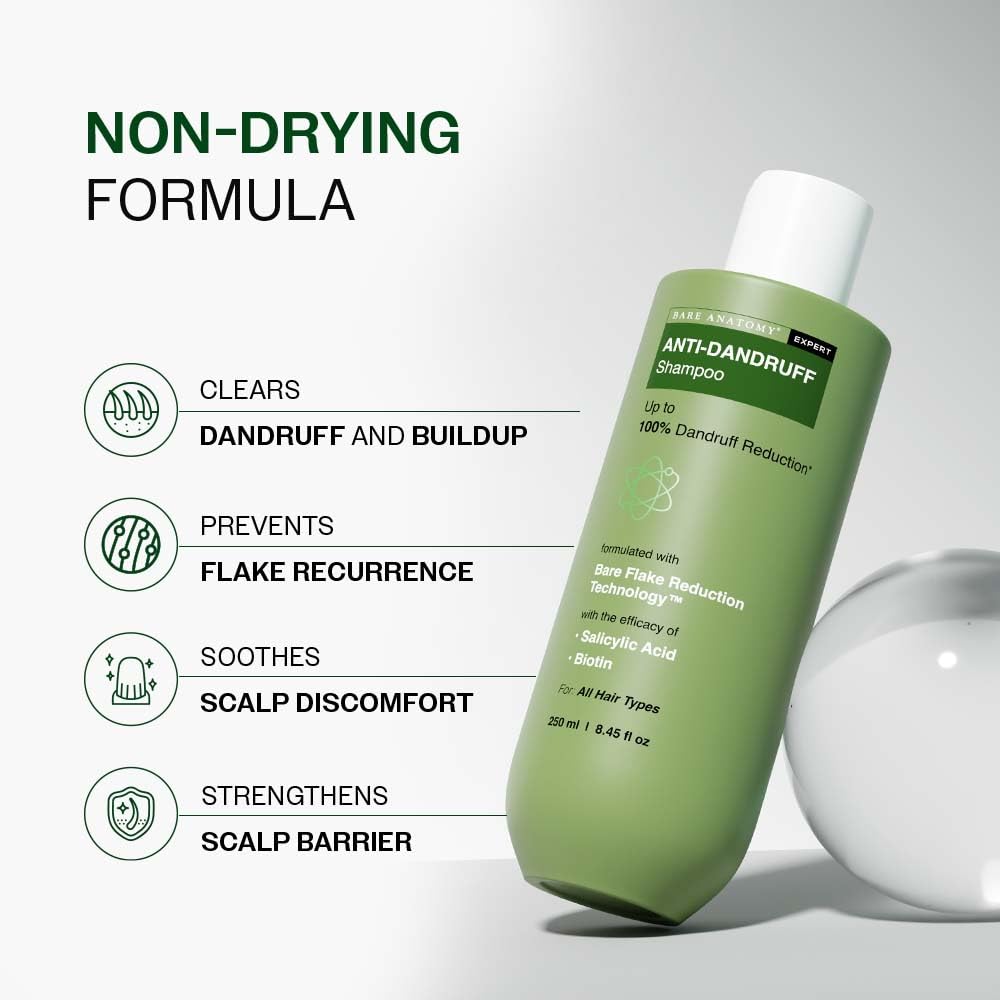 Applying Bare Anatomy Expert anti-dandruff shampoo to wet hair before rinse.