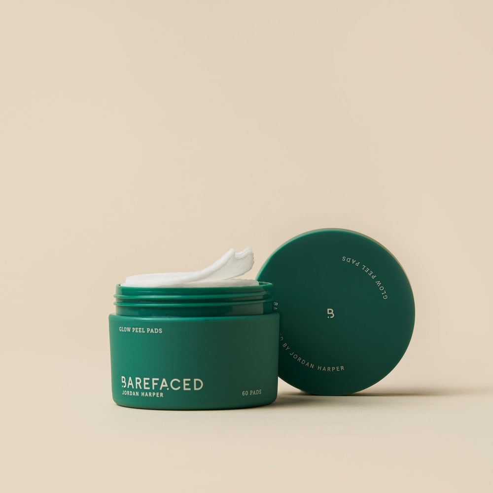 Barefaced Glow Peel Pads bottle beside pads highlighting exfoliation and glow