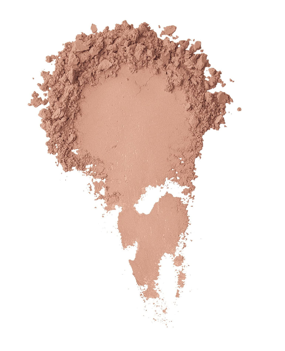 BareMinerals concealer swatch on skin demonstrates lightweight, blendable coverage for redness and blemishes