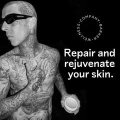 Barker Wellness Tattoo Butter being massaged into healing ink for hydration