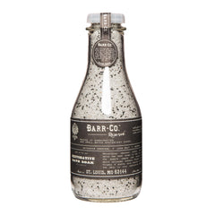 Barr-Co Reserve bath salts jar with woodsy earthy scent for a calming soak.