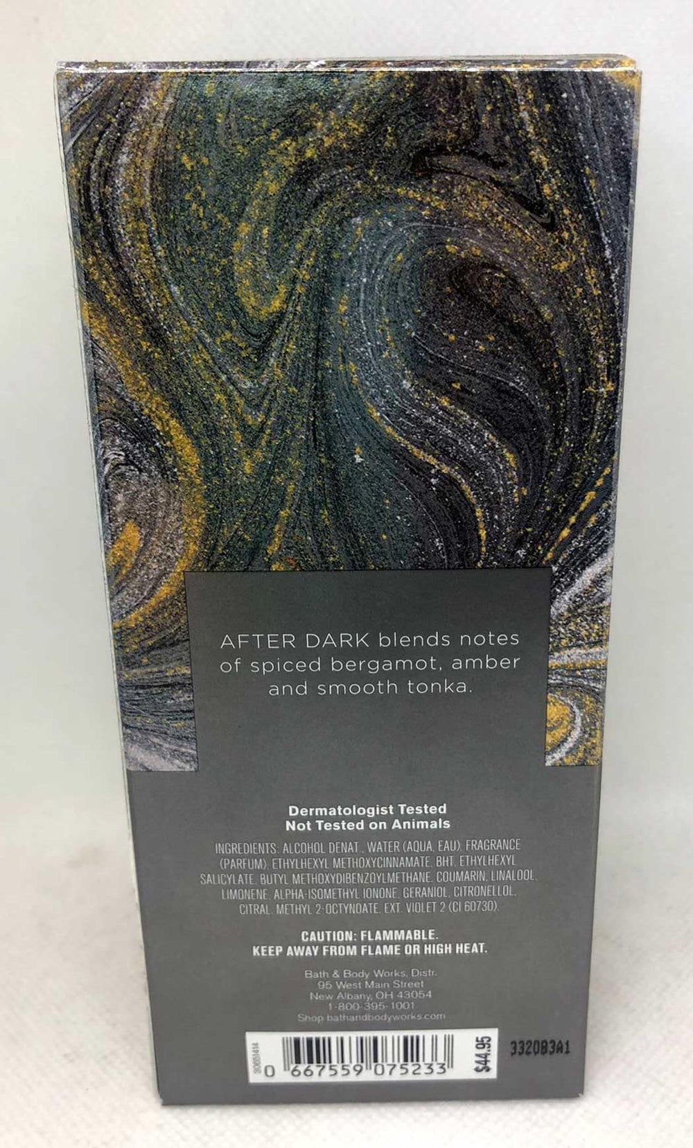 Bath & Body Works After Dark bottle close-up highlighting amber notes and spice.