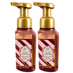 Bath and Body Works Crushed Candy Cane foaming hand soap bottles with seasonal design for festive home care