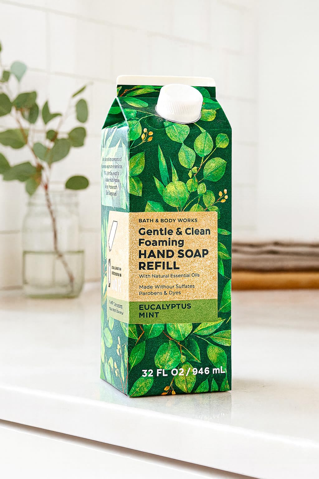 Bath and Body Works Eucalyptus Mint refill bottle pour for easy, mess-free hand soap replenishment.