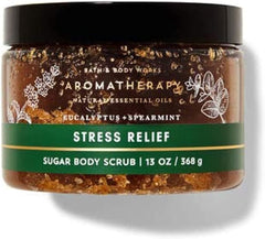 Close-up texture of Bath & Body Works scrub reveals gentle sugar grains for cleansing.