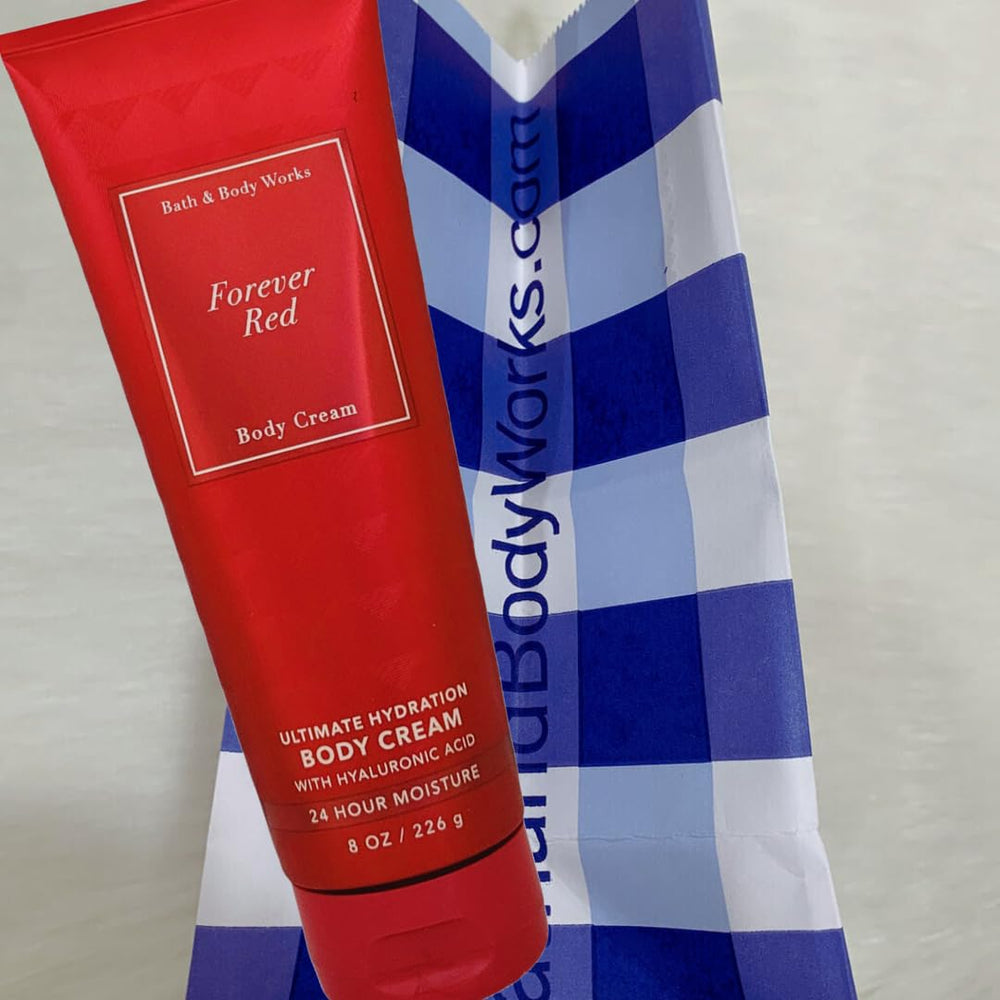 Forever Red cream being massaged into skin shows non-greasy absorption.