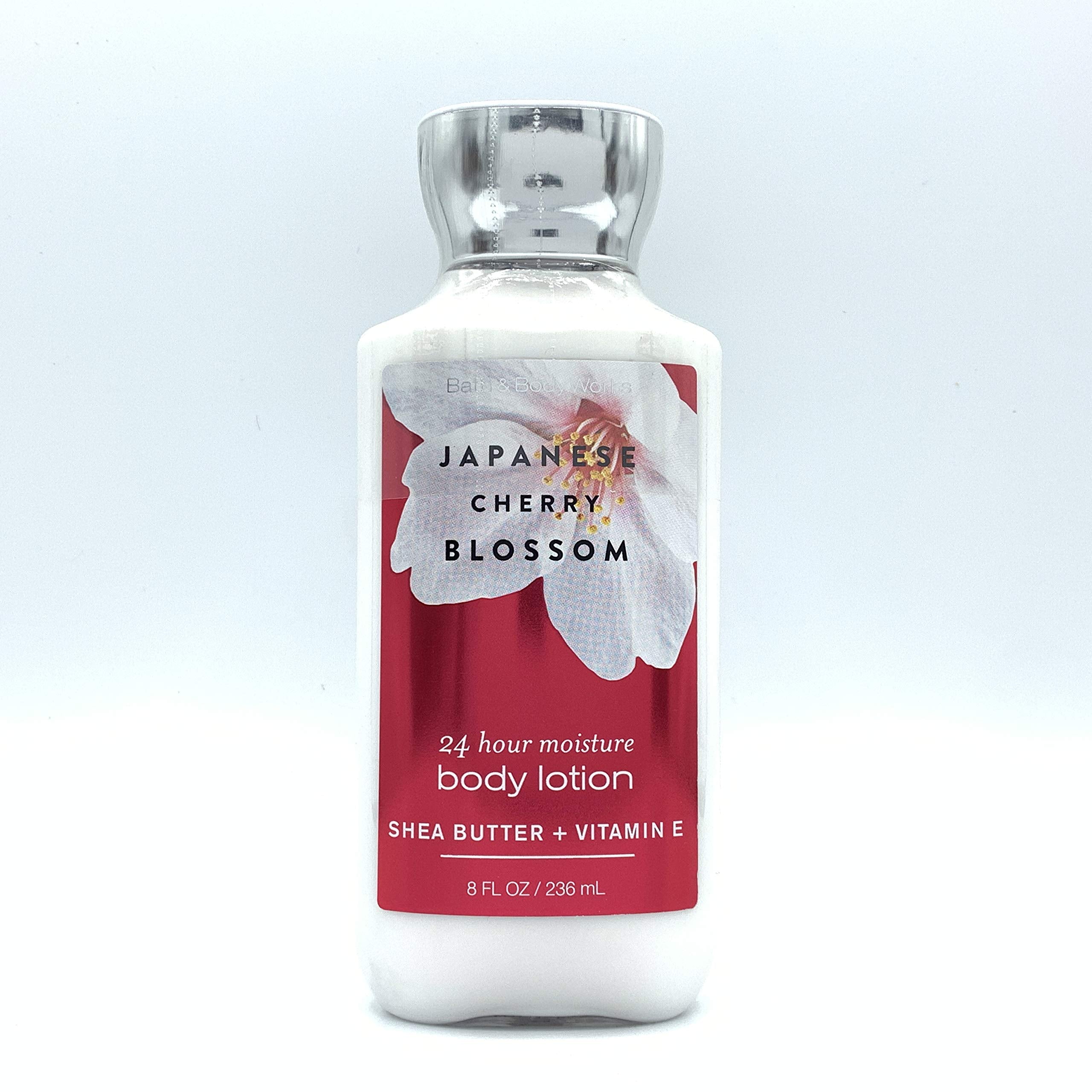 Japanese Cherry Blossom lotion bottle top view highlighting nourishing formula and smooth skin feel.