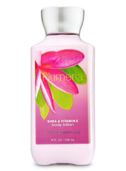 Bath & Body Works Signature Plumeria lotion bottle for daily moisture and tropical fragrance.
