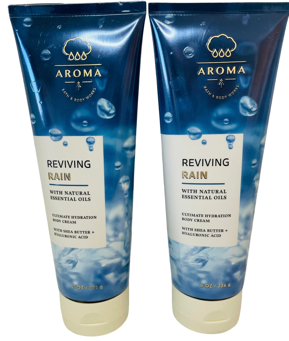 Bath & Body Works Reviving Rain body cream bottle visible, offering lasting hydration and a refreshing scent.