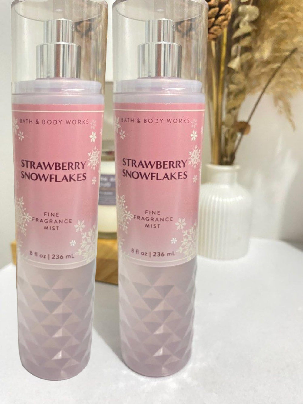 Bath & Body Works Strawberry Snowflakes mist 8 oz with two bottles shown for sharing.