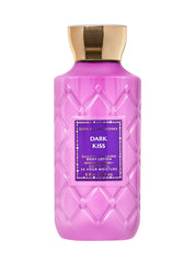 Bath and Body Works Super Smooth Lotion Dark Kiss bottle delivers 16 hours of moisture and cozy scent.