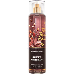 Bath & Body Works Sweet Whiskey body spray bottle showing easy-to-use pump for light coverage.