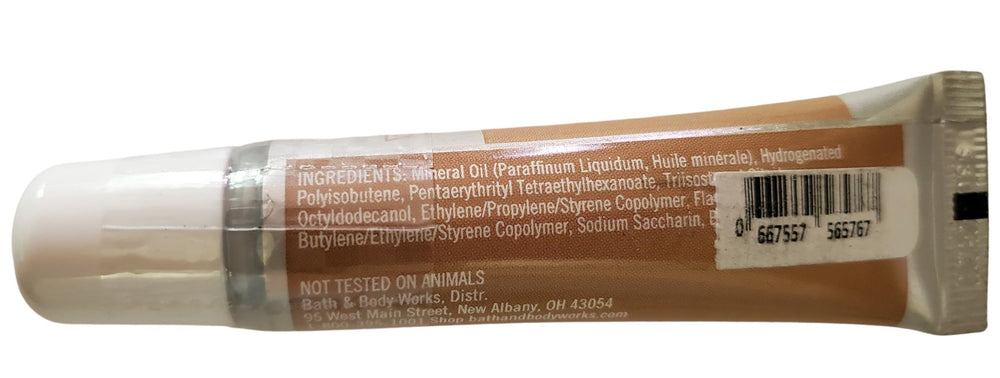 Bath & Body Works Vanilla Lip Gloss swatch reveals glossy vanilla finish and smooth lips.