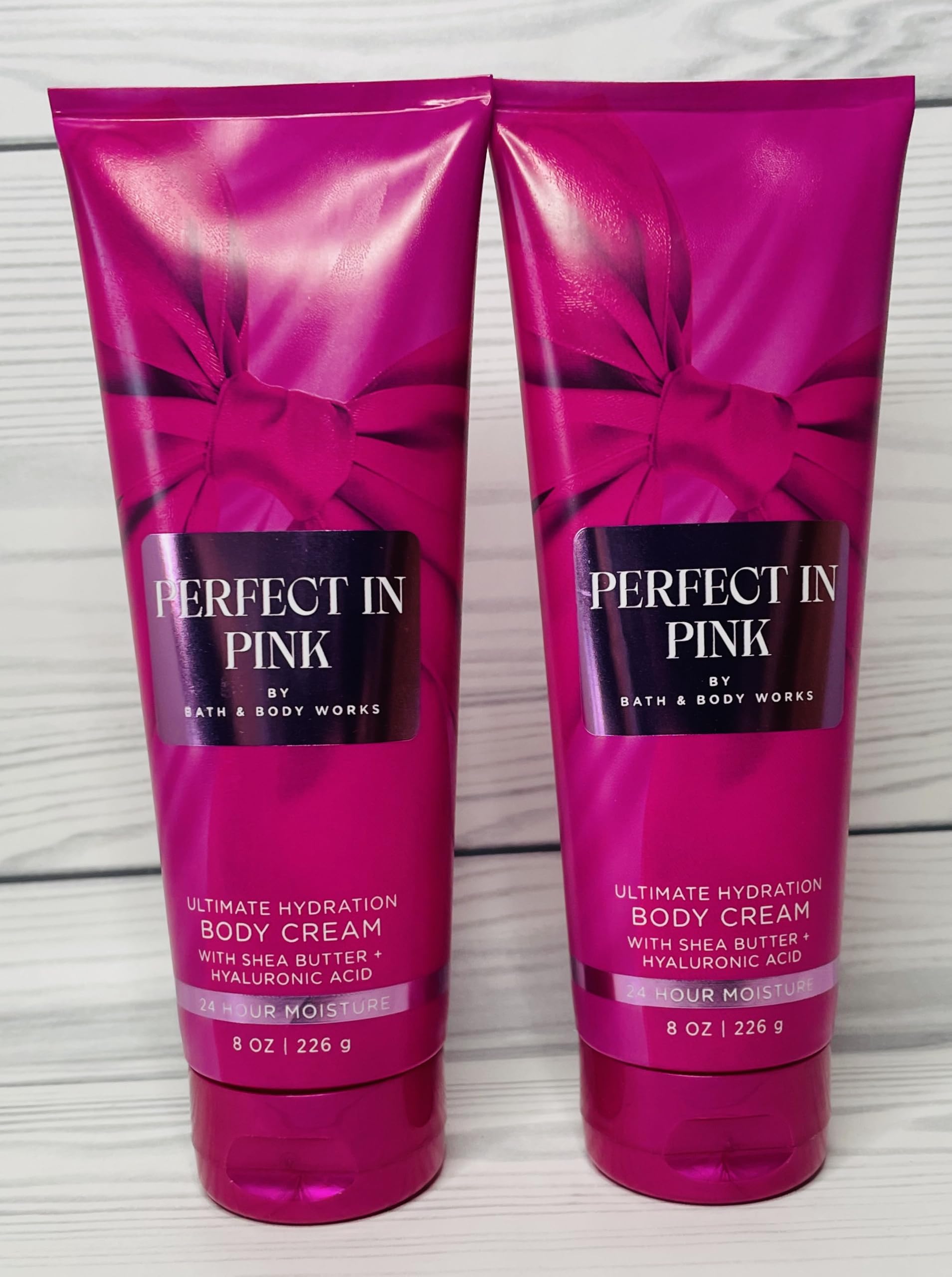 Bath & Body Works Perfect in Pink packaging with duo 8 oz tubs on vanity.
