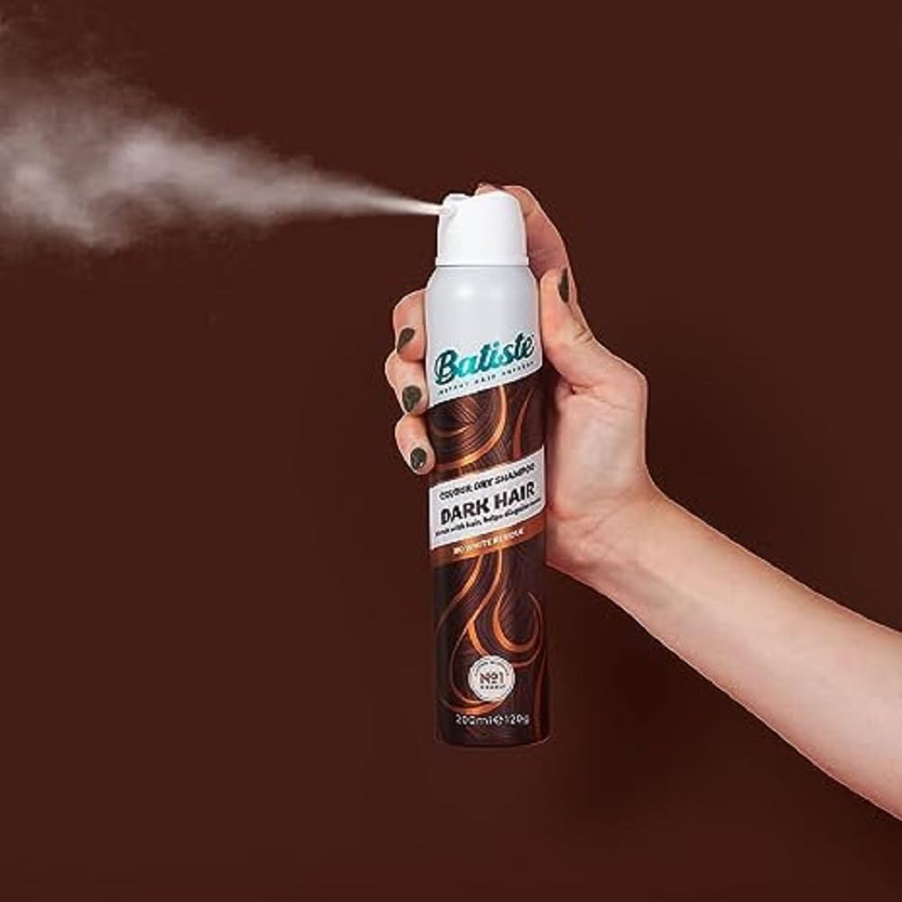 Batiste Dry Shampoo Dark & Deep Brown canister on shelf in pack of three