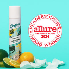 Batiste Original Dry Shampoo spritzing on roots for oil absorption.
