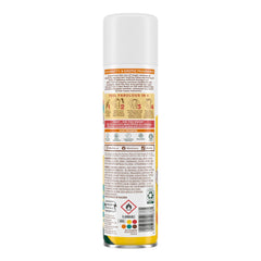 Batiste Tropical spray application shows quick root refresh and scent.