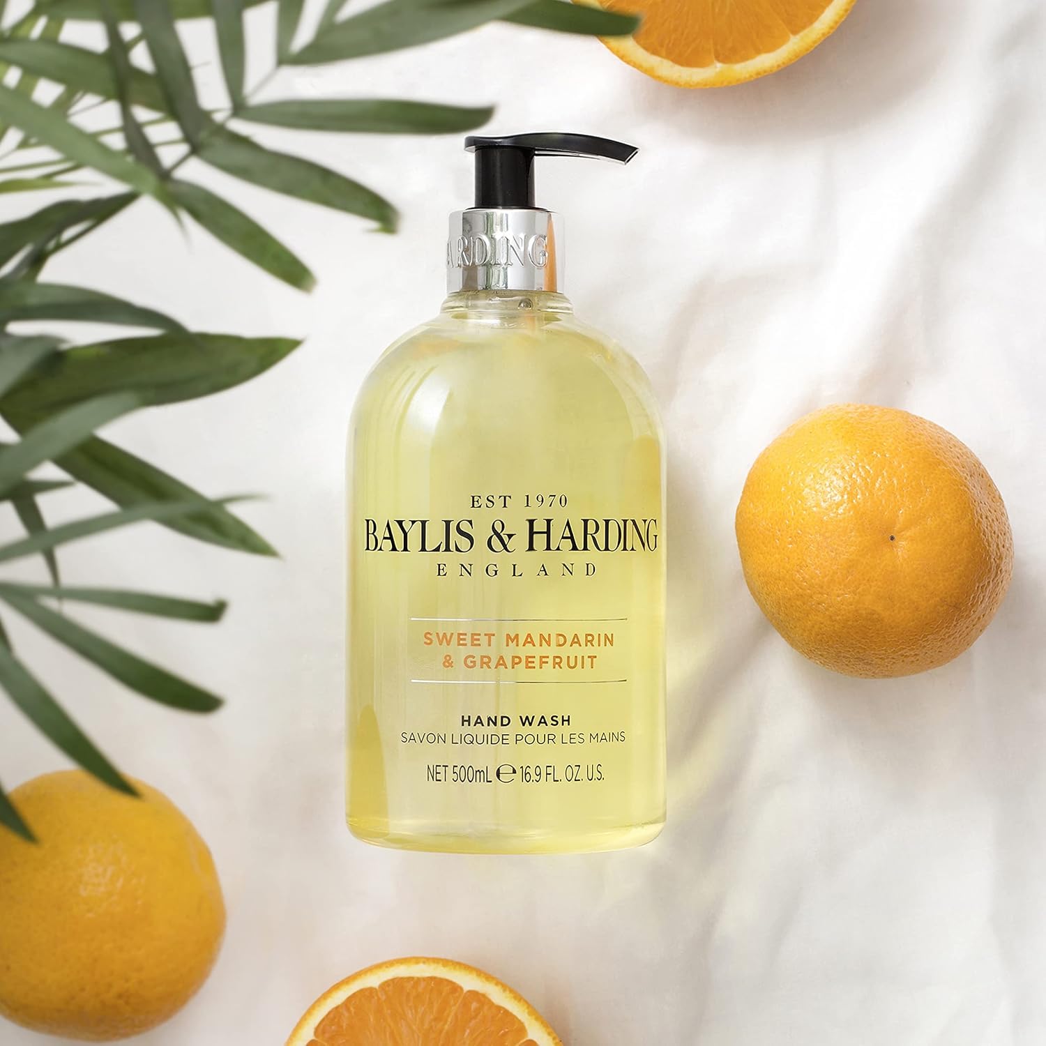 Recyclable pump and cap on Baylis and Harding bottle