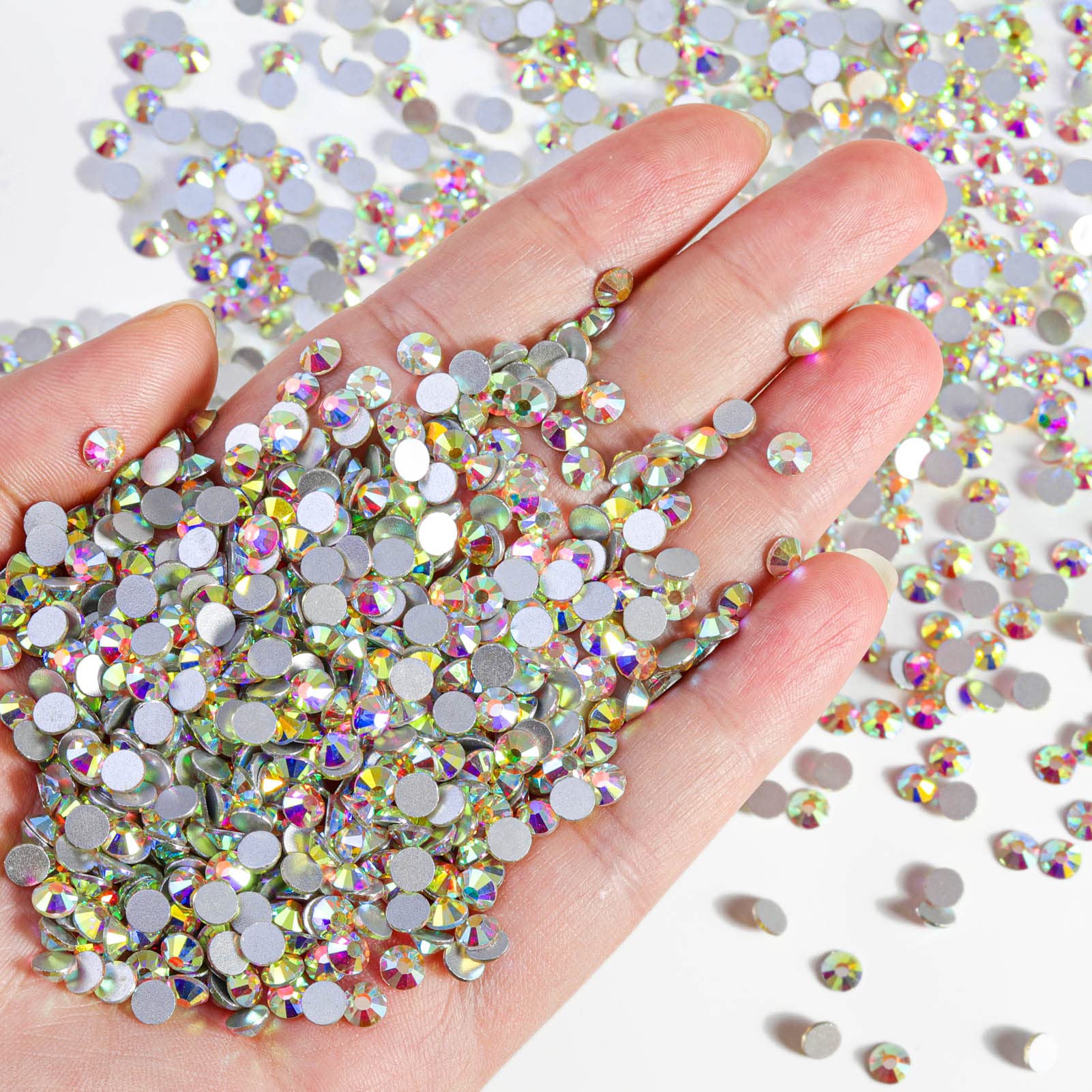 Beadsland crystal AB flatback rhinestones on nails showcase eye-catching shimmer.