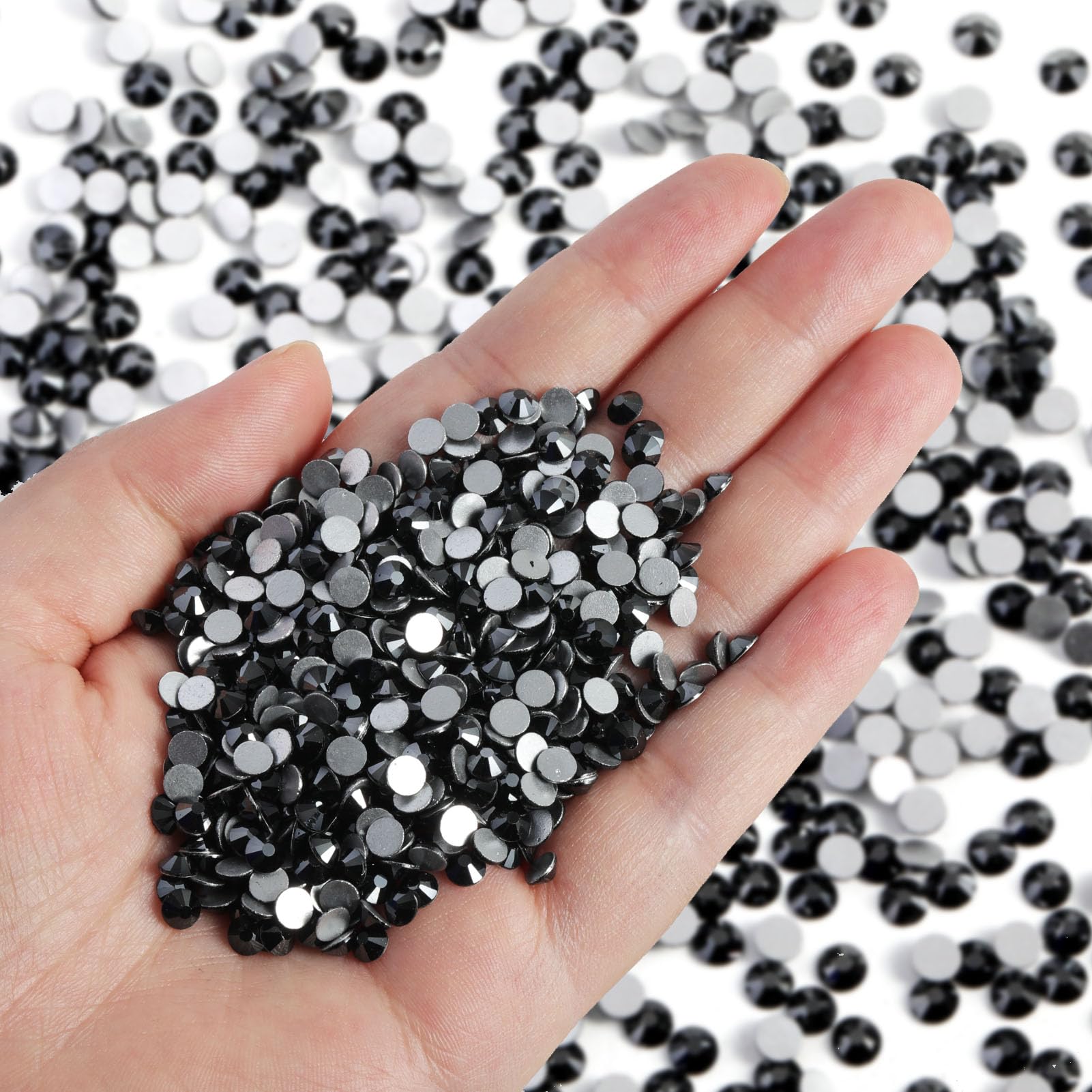 Beadsland flatback rhinestones closeup showing sharp cuts and high clarity for nails.