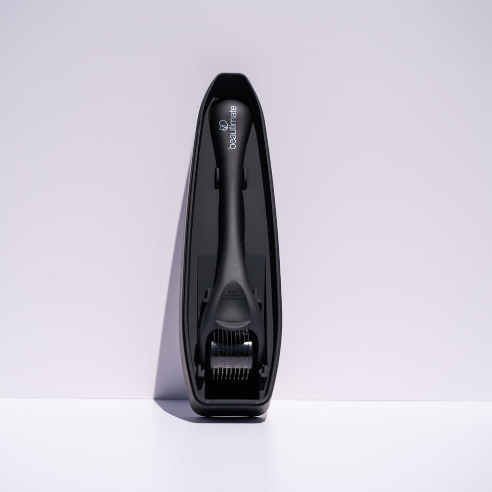 Beautimate microneedle derma roller in use on the scalp.