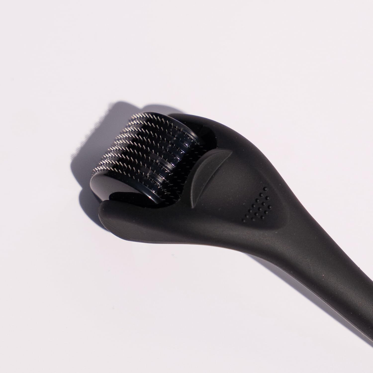 Beautimate derma roller in a travel-ready setup for portability.