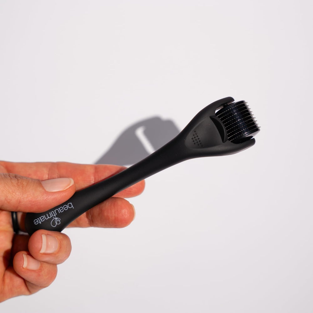 Beautimate microneedle derma roller in use on the face.