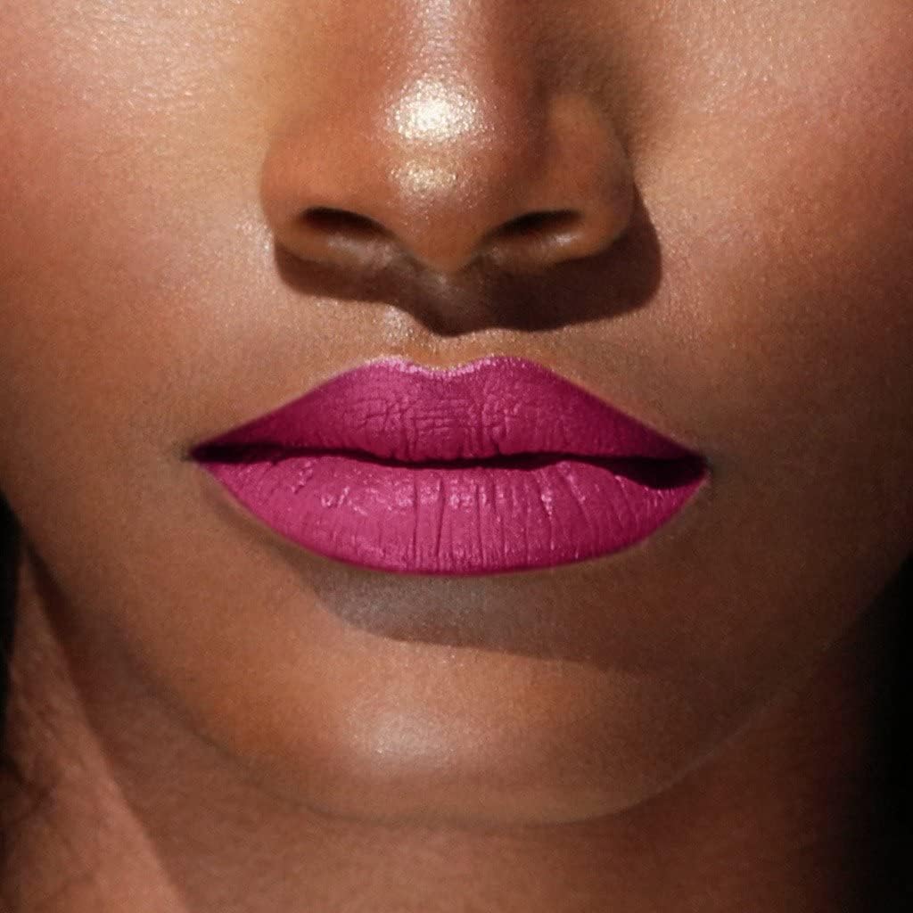 Beauty Bakerie Lip Whip vegan cruelty-free badge beside bold lip color